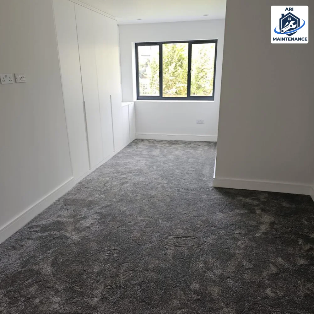 Bedroom, grey carpet, fitted wardrobes