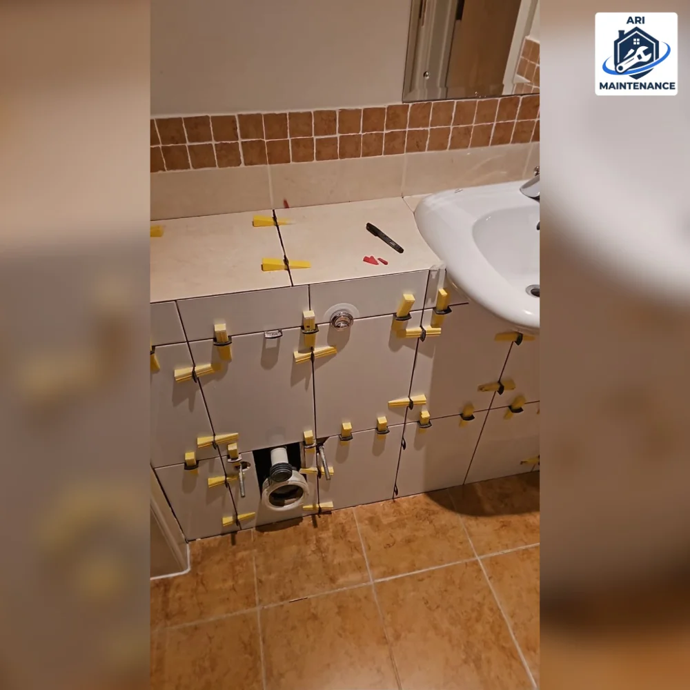 Rough plumbing pipework, copper + yellow gas fittings (BEFORE)